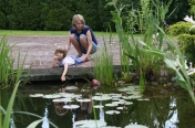 Nina with her Mum by the pond, June 2009